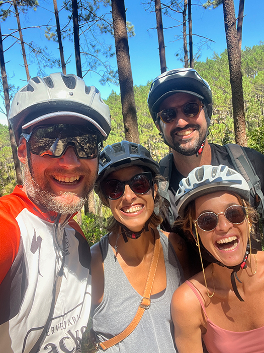 Happy cyclists smiling on a Somewherein.pt tour