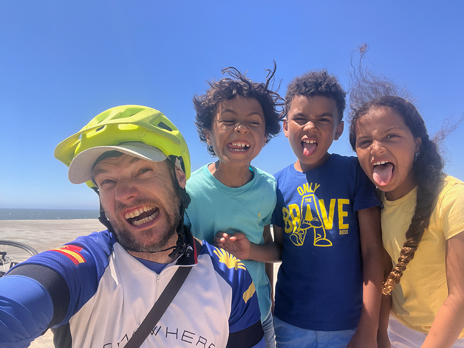 Happy cyclists smiling on a Somewherein.pt tour