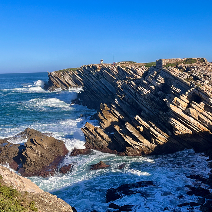 Jagged Atlantic cliffs and waves along Portugal's Silver Coast