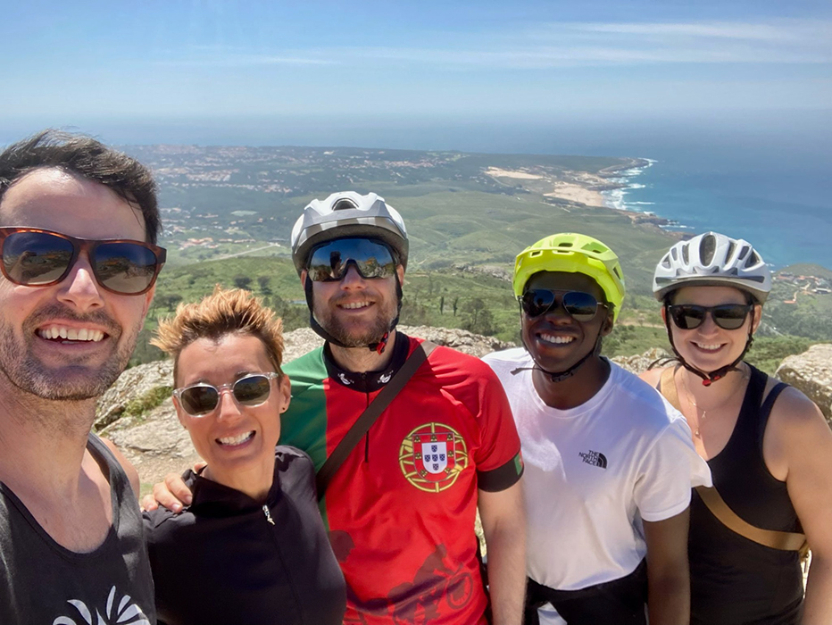 Happy cyclists smiling on a Somewherein.pt tour