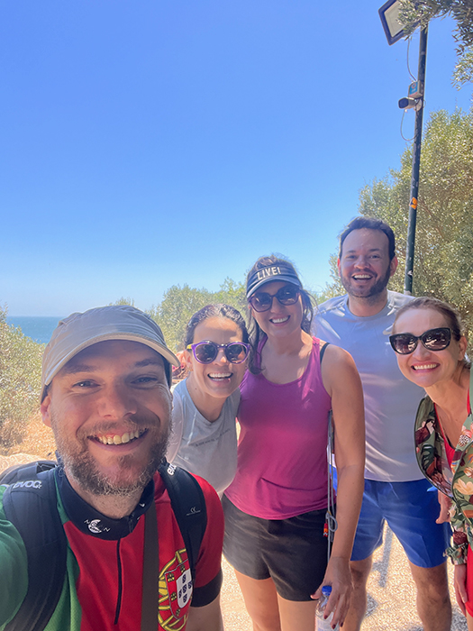 Happy cyclists smiling on a Somewherein.pt tour