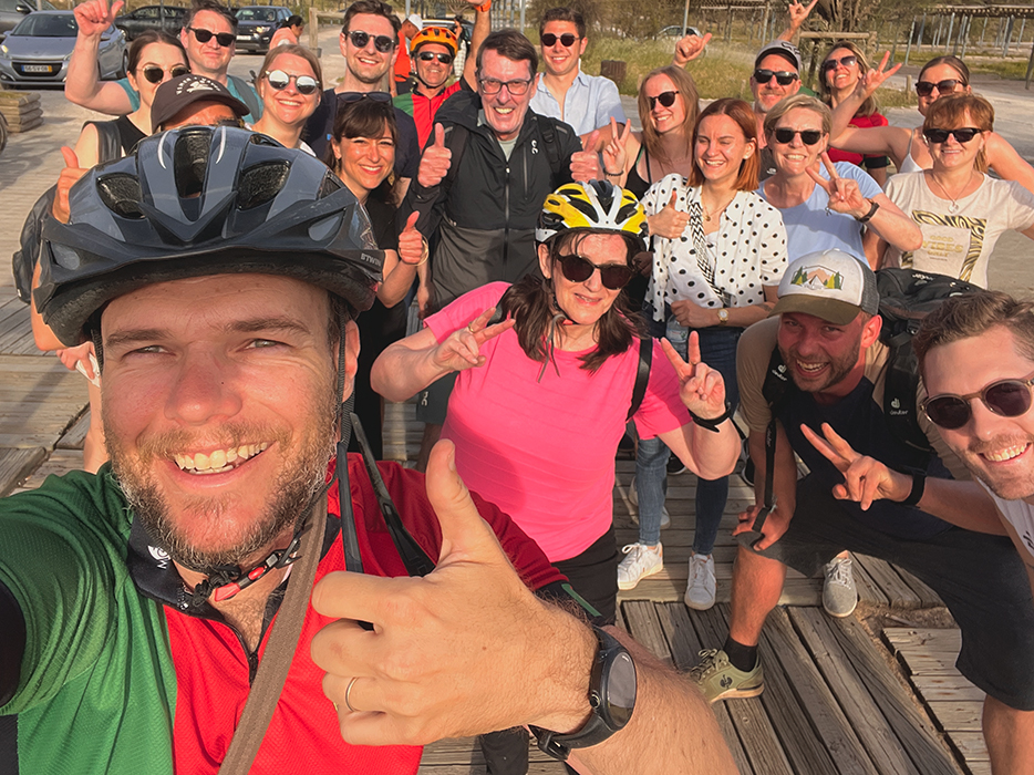 Happy cyclists smiling on a Somewherein.pt tour