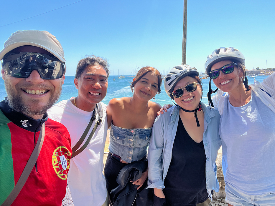Happy cyclists smiling on a Somewherein.pt tour
