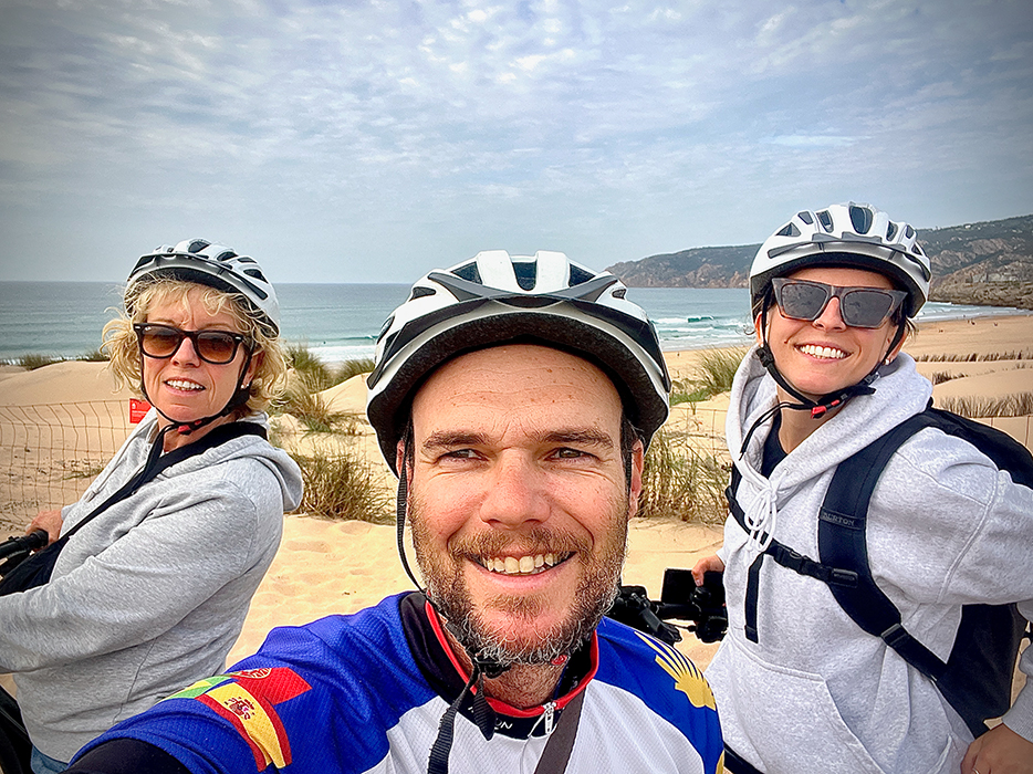 Happy cyclists smiling on a Somewherein.pt tour