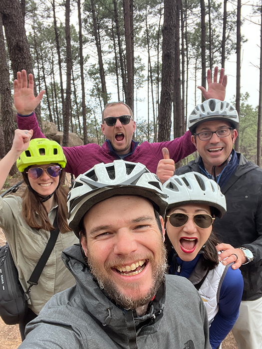 Happy cyclists smiling on a Somewherein.pt tour
