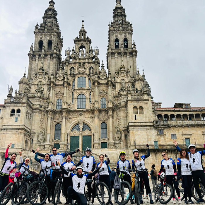 Happy cyclists smiling on a Somewherein.pt tour