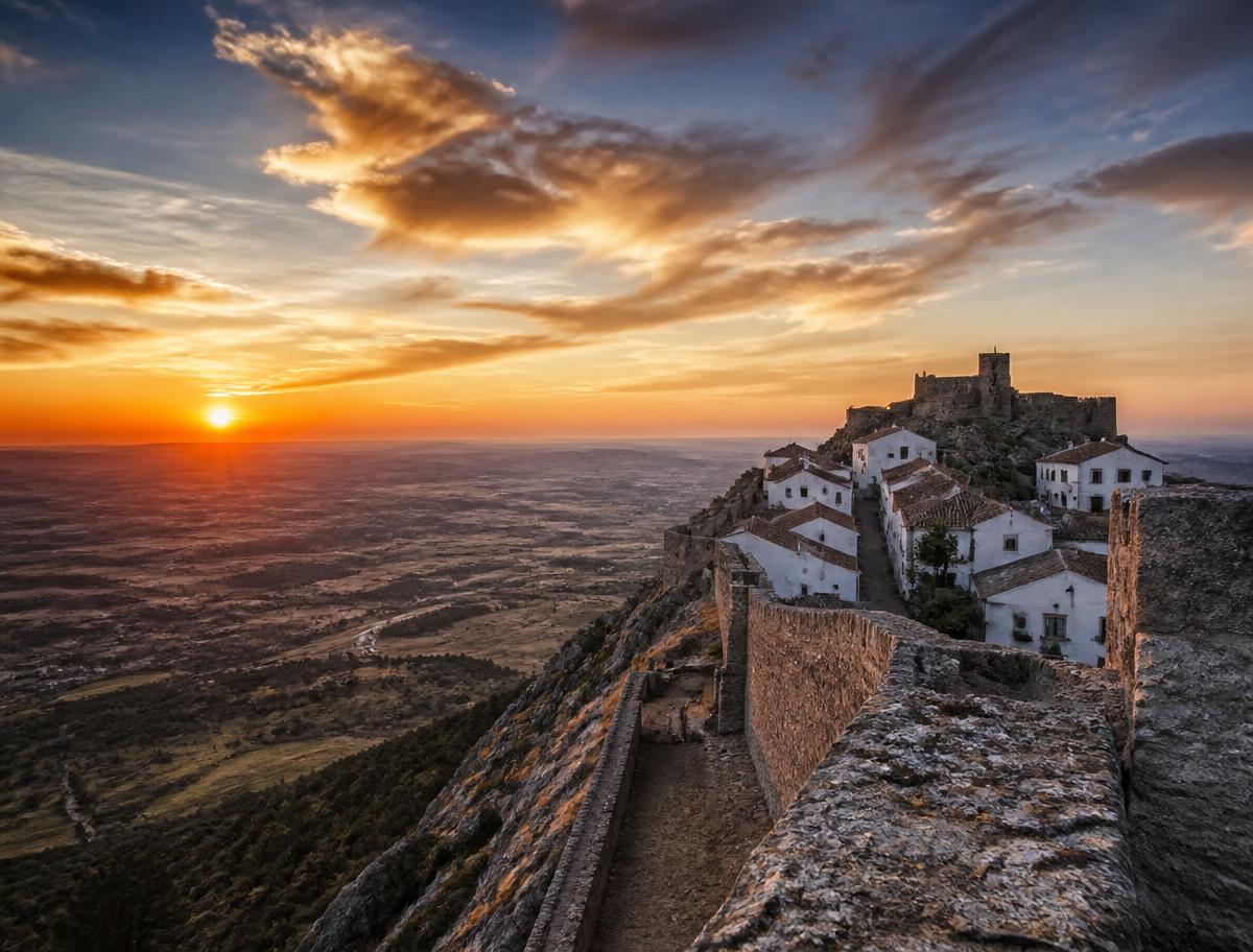 Marvão's white houses and castle walls high above the plains